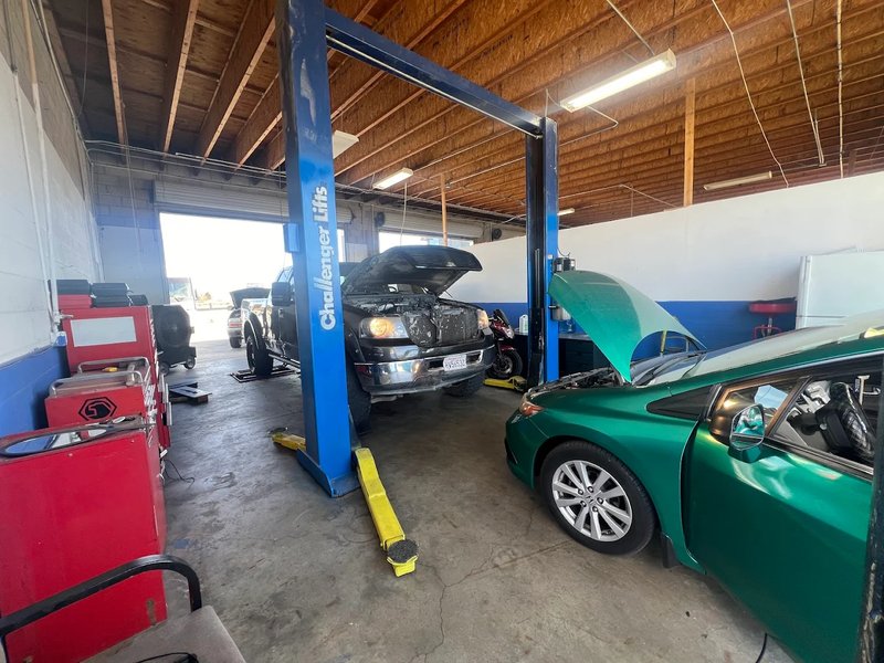 Busy Shop Interior VIP Smog Palmdale Challenger Lifts